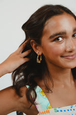 Twisted in Gold Earrings