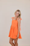 Orange Dress with Bows and White Trim