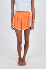 Orange Shorts with White Trim Detail